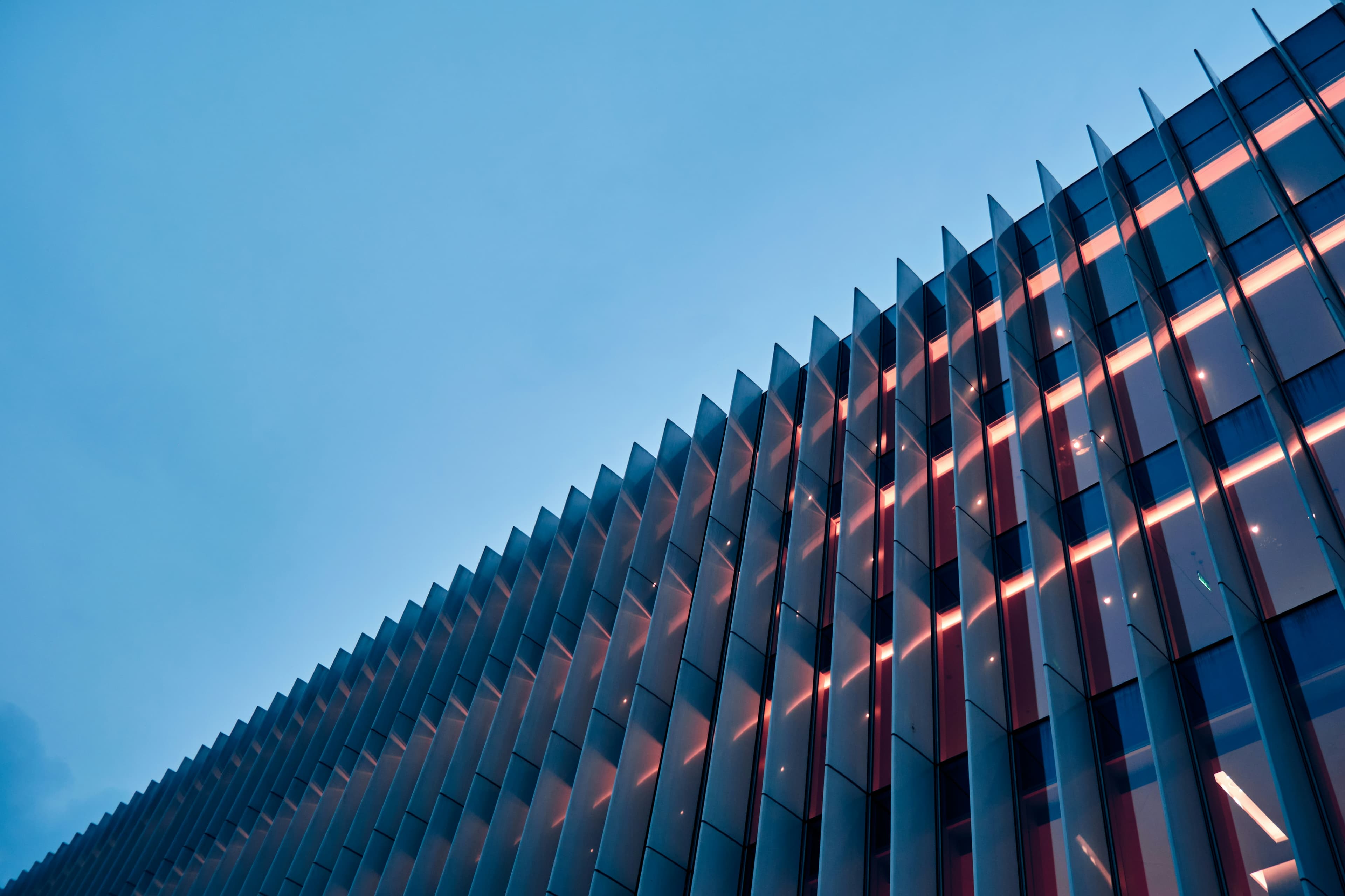 Modern glass office building leased through MPD Realteck corporate leasing services